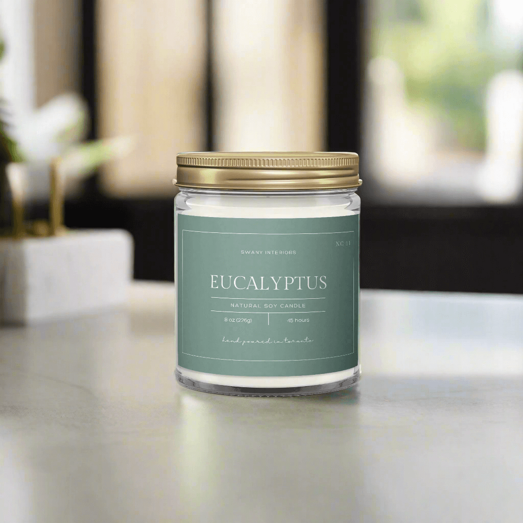 Custom branded clear glass candle used for client gifts, events, and retail collections.