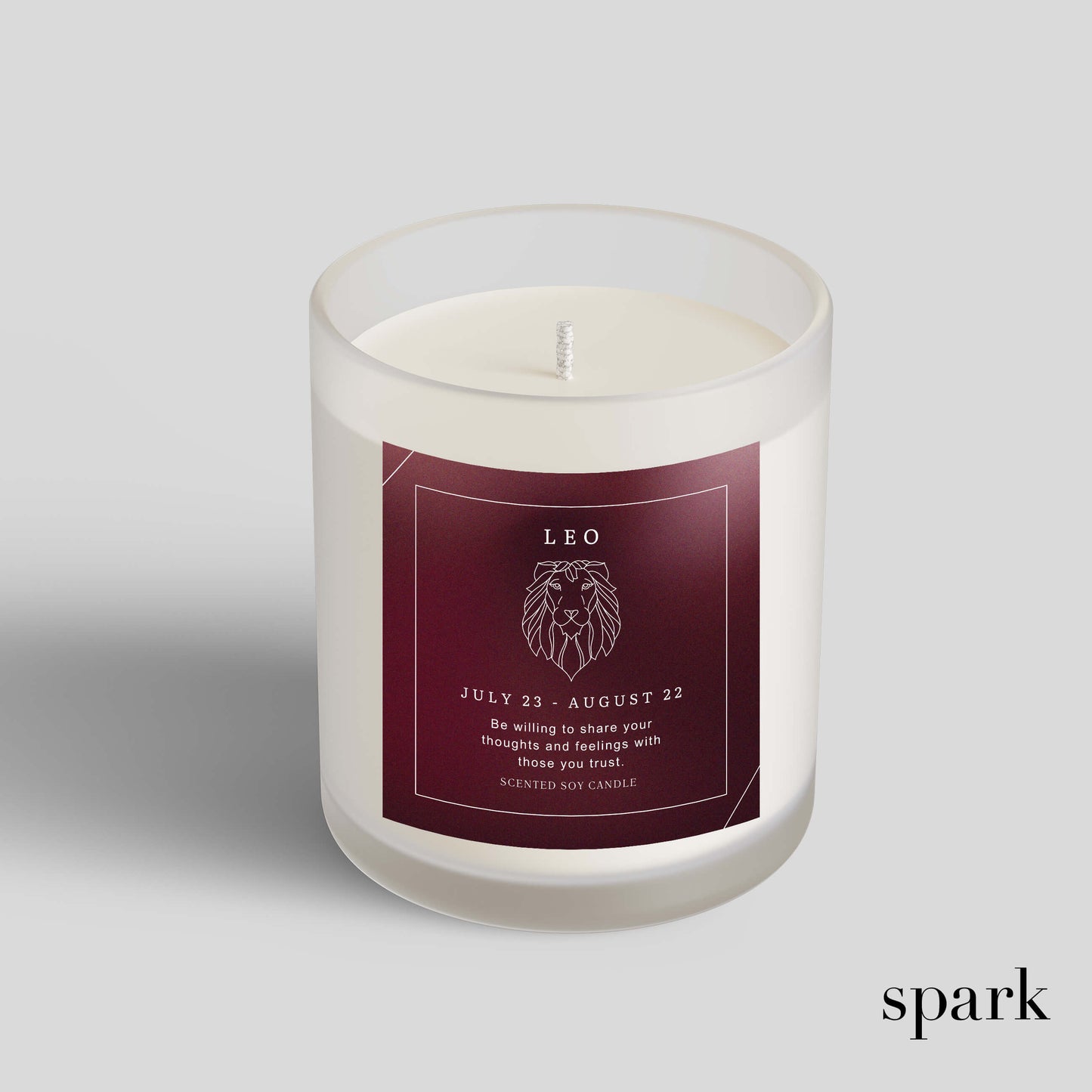 Custom 10oz frosted clear glass candle with full-color label manufactured for branded gifting and retail collections.