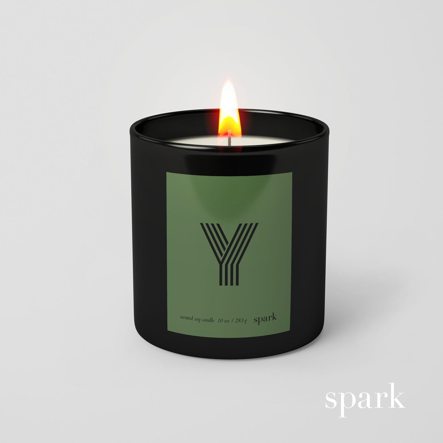 Personalized monogram candle in 10oz matte black glass with green striped letter initial custom label