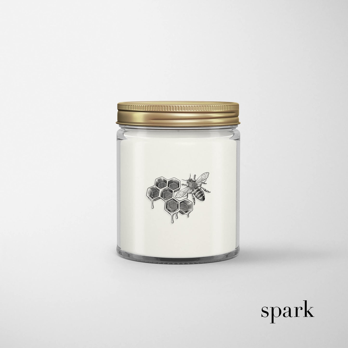 Custom branded 4oz clear glass candle with gold lid and design imprint 