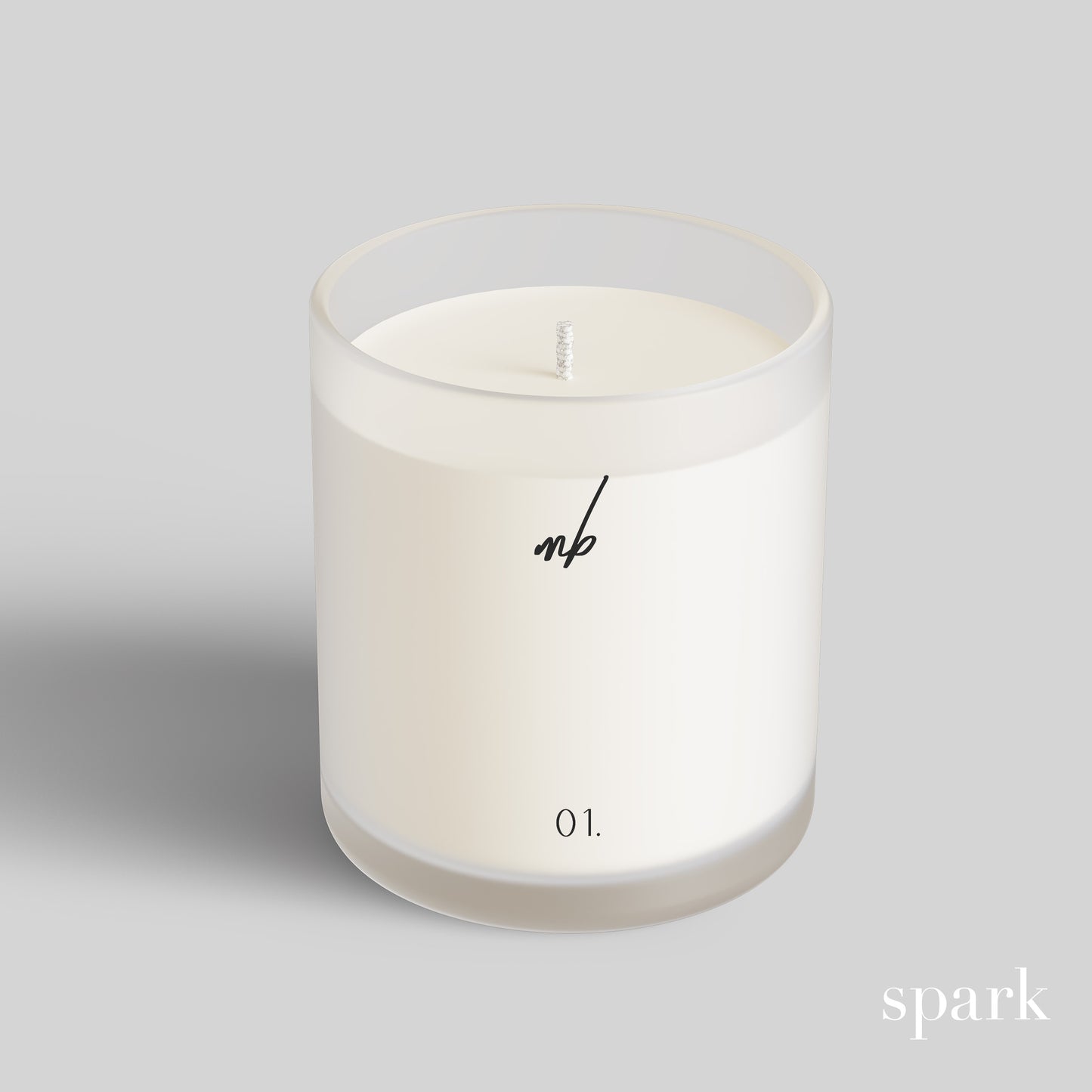 Close-up of single-color logo imprint on a 10oz frosted clear glass candle.