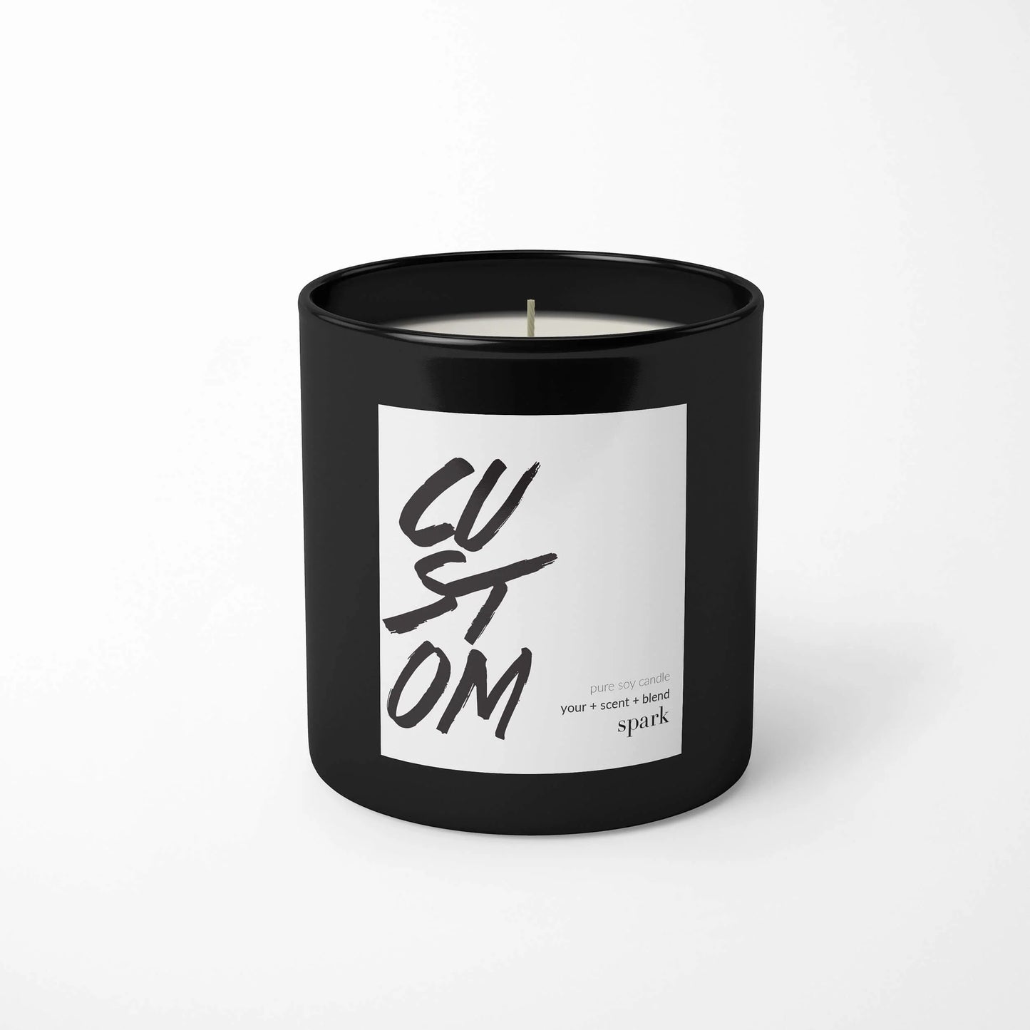 Custom 10oz matte black glass candle with full-color label manufactured for corporate gifting and branded merchandise.